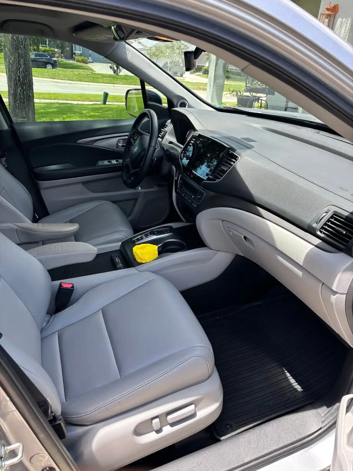 Honda Pilot gray leather interior after an interior detail