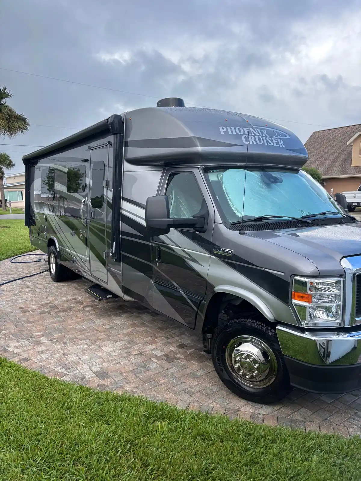 Phoenix Cruiser motorhome detailed on-site in a residential driveway
